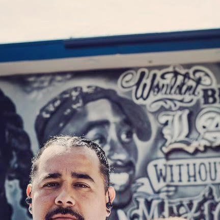 In front of the LA mural